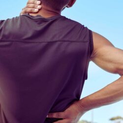 How can stiff and tight muscles result in back pain?